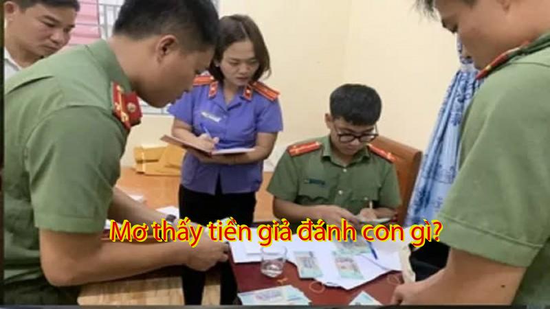 Mơ thấy tiền giả đánh con gì?